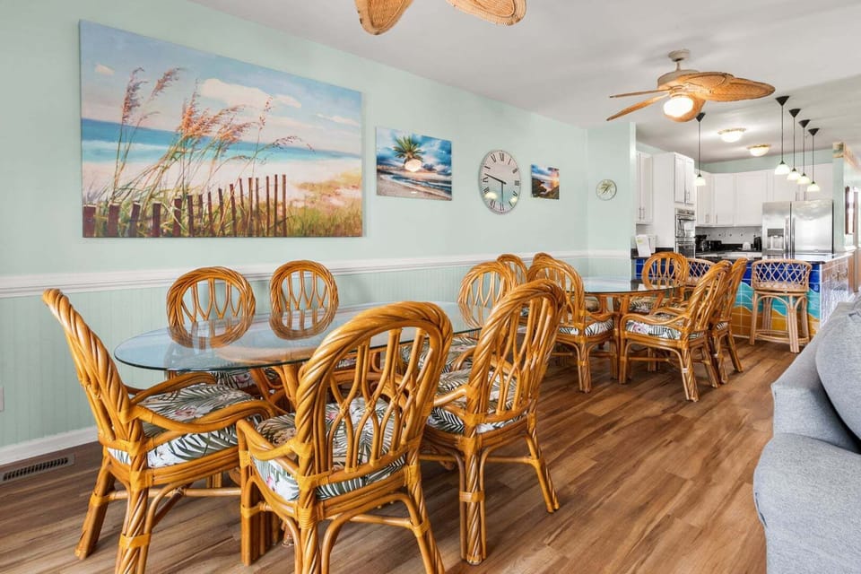 Dining table for a crowd beside the kitchen at Diamond Dunes A, an 8-bedroom Crescent Beach rental