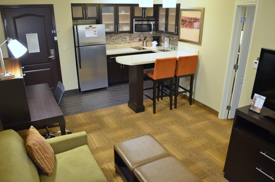 Prepare meals and enjoy snacks in this well-equipped kitchen area, complete with modern appliances.