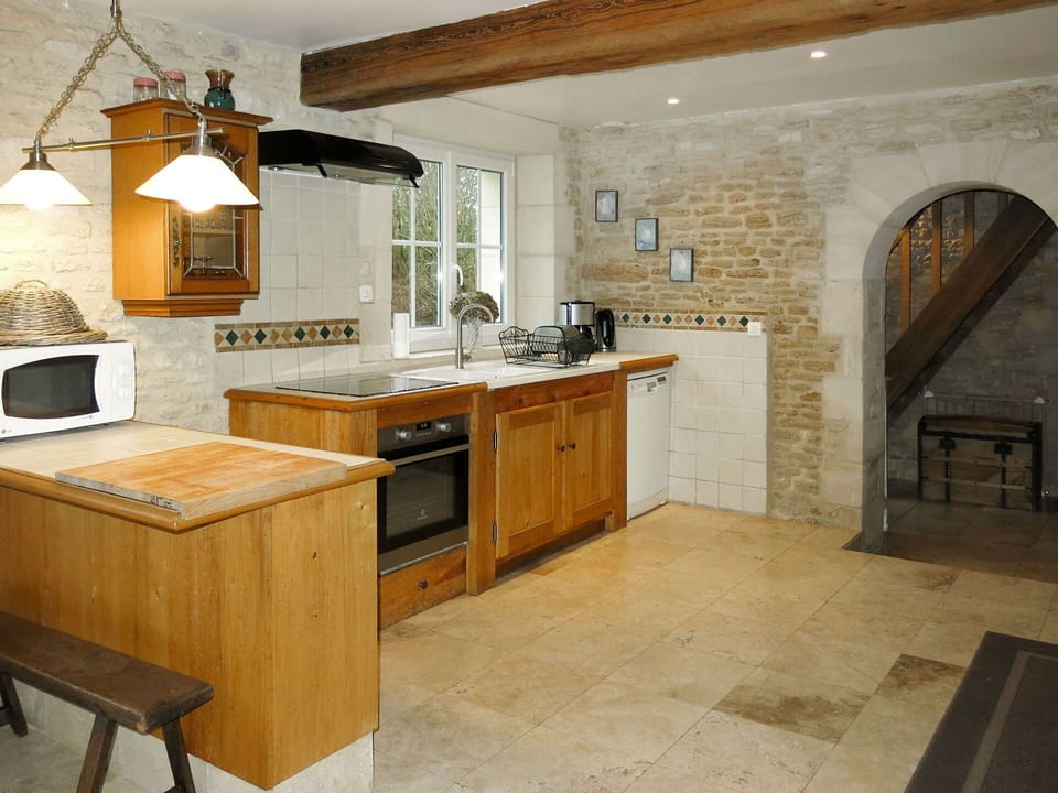 Countertop, Cabinetry, Property, Furniture, Kitchen, Kitchen Appliance, Drawer, Kitchen Stove, Home Appliance, Lighting