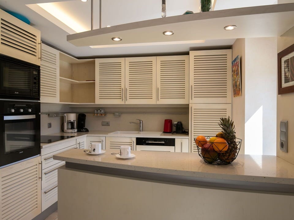 Furniture, Wood, Kitchen, Interior Design, Countertop, Cabinetry, Flooring, Kitchen Appliance, Lighting, Home