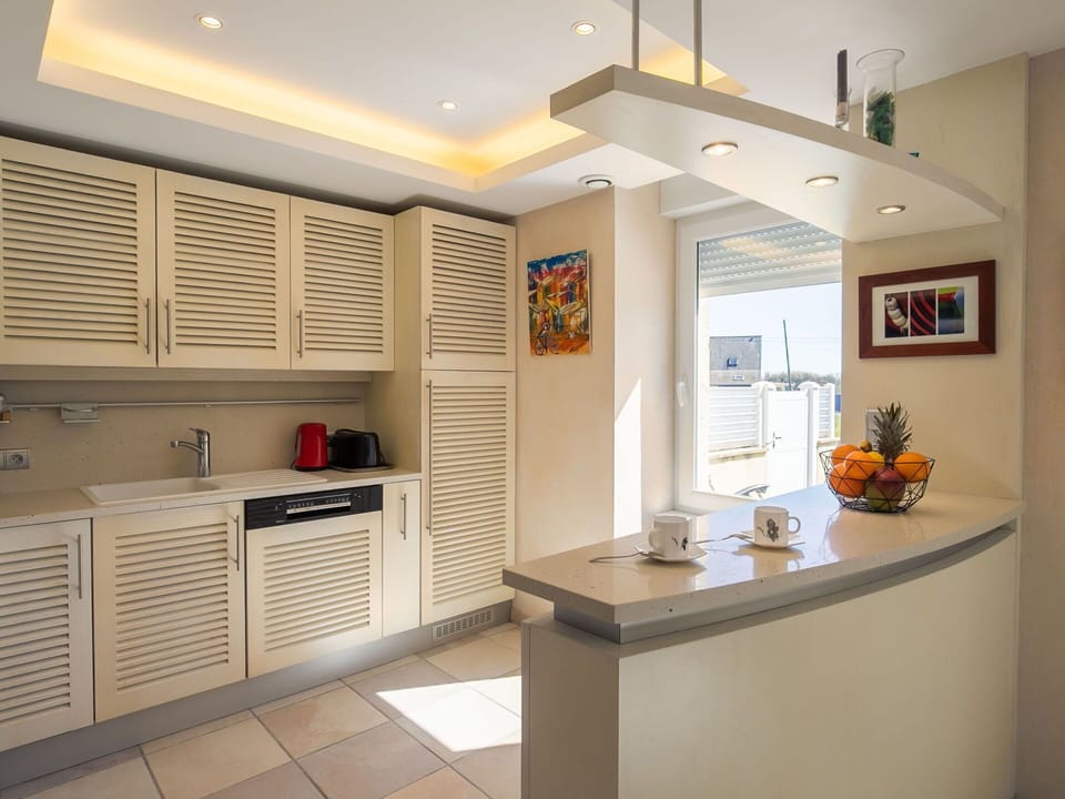 Furniture, Interior Design, Wood, Flooring, Countertop, Kitchen, Ceiling, Cabinetry, Lighting, Chair