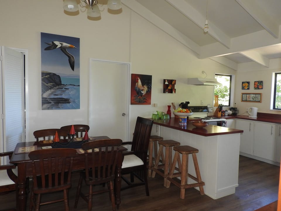 View of kitchen and dining area.