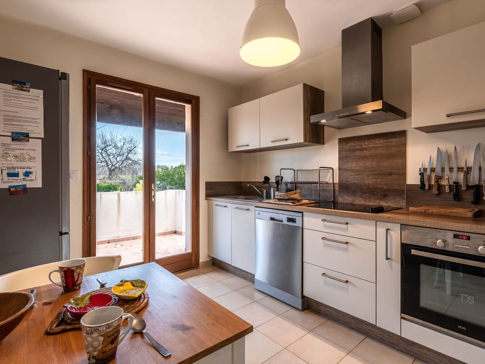 Cabinetry, Countertop, Property, Furniture, Table, Kitchen, Wood, Interior Design, Kitchen Stove, Kitchen Appliance