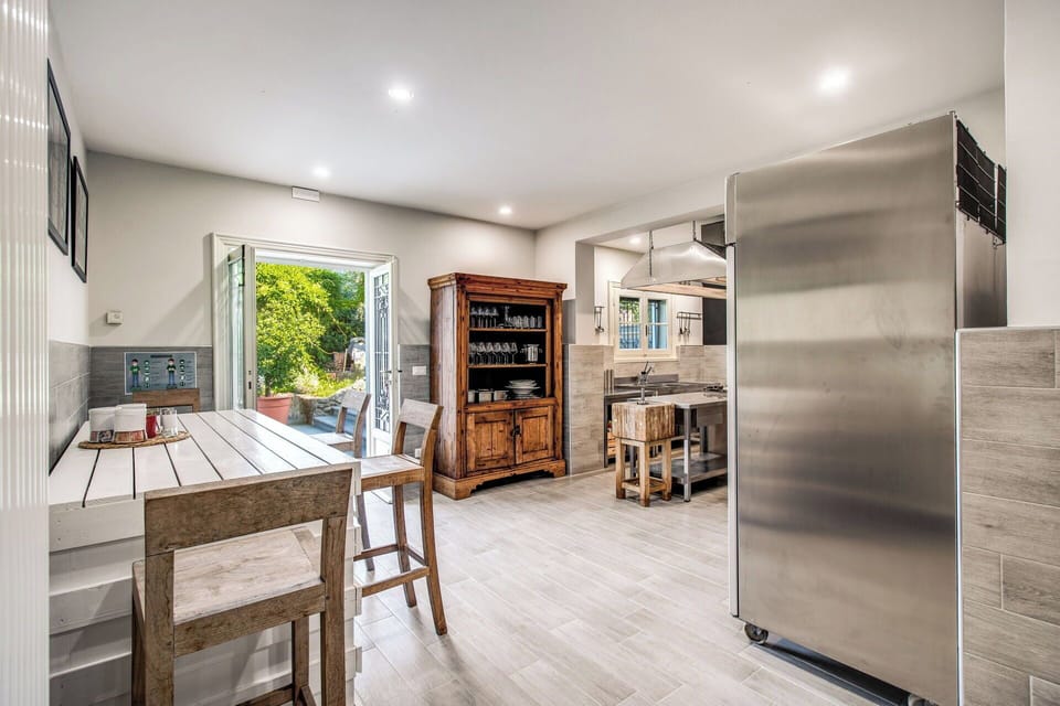 Furniture, Flooring, Interior Design, Floor, Wood, Wood Flooring, Ceiling, Kitchen, Major Appliance, Countertop