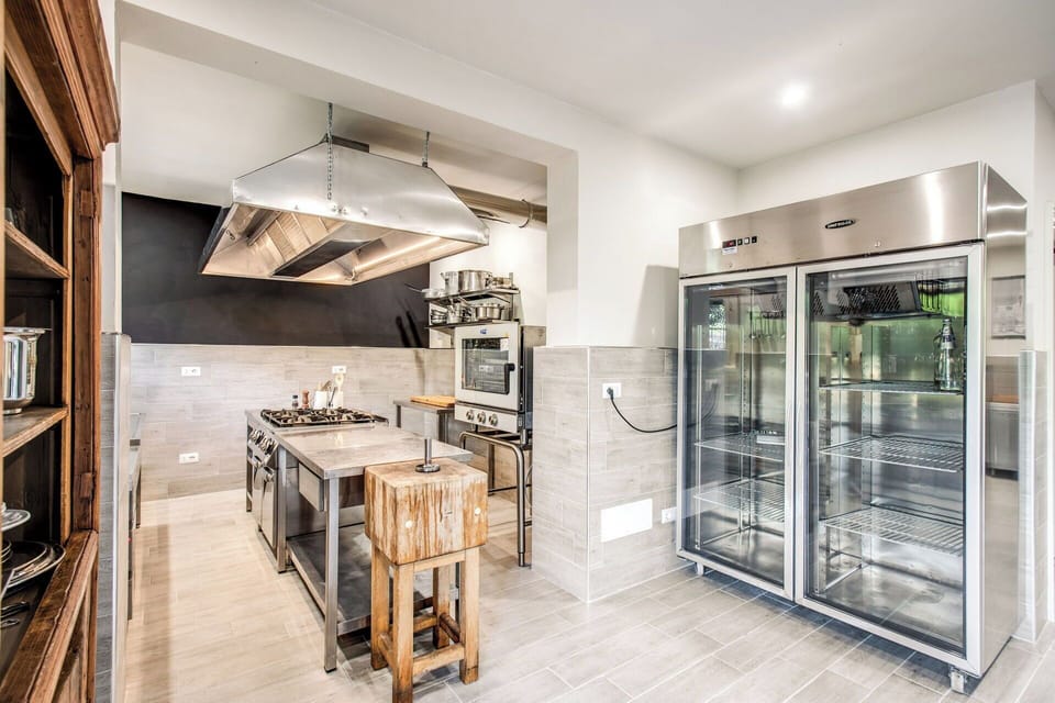 Flooring, Interior Design, Kitchen, Furniture, Wood, Ceiling, Floor, Countertop, Kitchen Appliance, Lighting