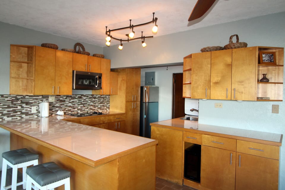 Large kitchen is fully equipped with everything you will need to