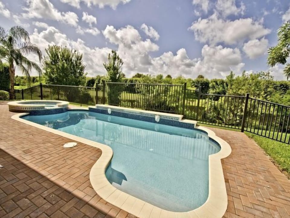 30 foot pool transitions on steps from 1 foot to 5 feet deep at far end.