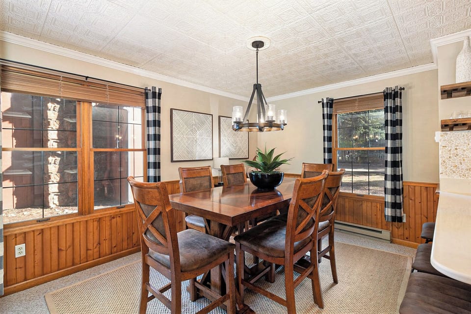 Spacious dining room with windows all around