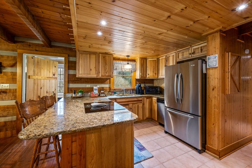 Rustic style kitchen with wide granite counter tops
