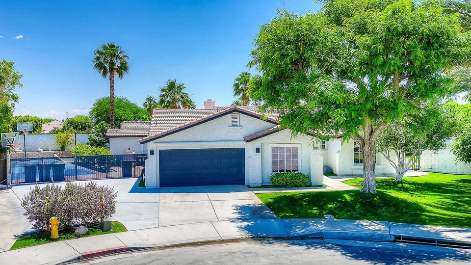 Parking at this house is available for 6 cars maximum, 2 in the garage, 2 in the driveway and 2 on the street.