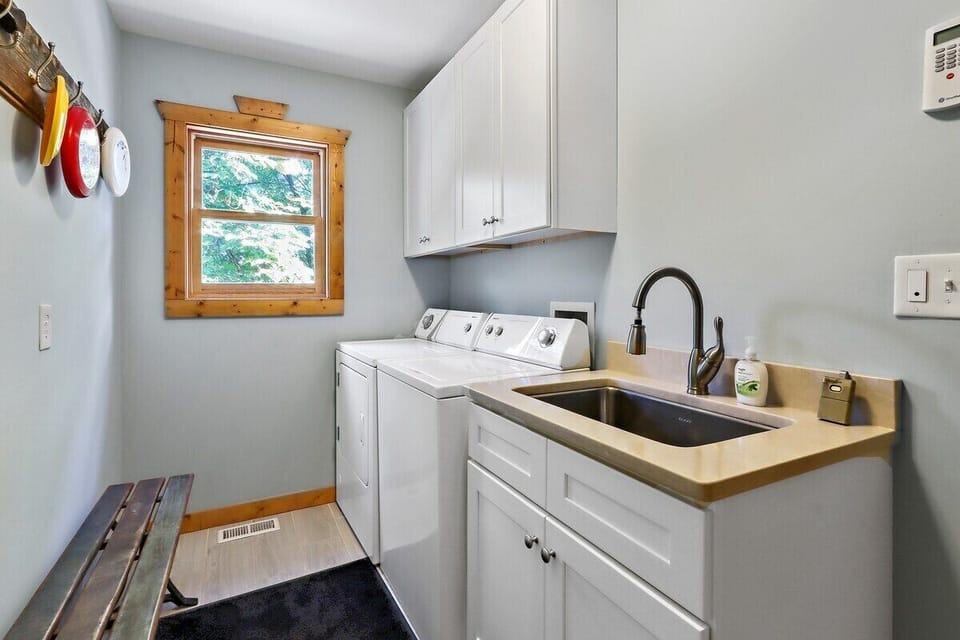 Washer and dryer with mess sink