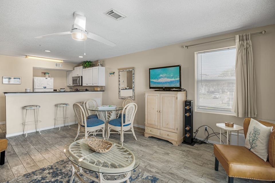 An easy open layout connects living and dining.