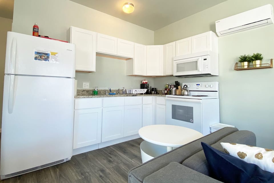 Cook your favorite meal or prepare snacks to go. We offer a large selection of spices, salt & pepper, toaster, large refrigerator, electric oven, microwave, coffee pot, tea, teapot, coffee, sugar, pots and pans, bakeware, and more.