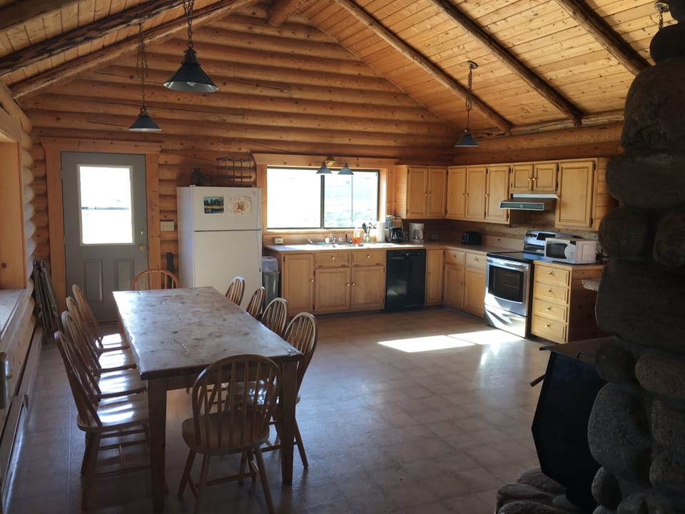 The large dining table has seating for 10.