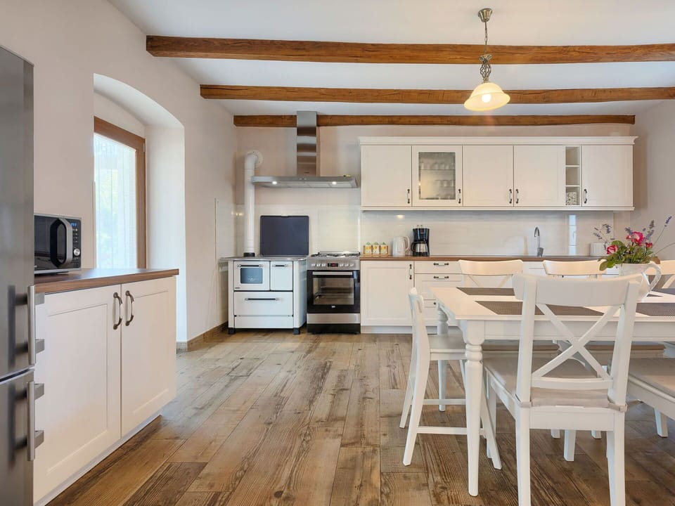 Furniture, Countertop, Room, Property, Kitchen, Cabinetry, Floor, Wood Flooring, Interior Design, Building