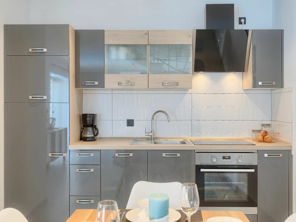 Tap, Cabinetry, Sink, Kitchen Sink, Furniture, Countertop, Plumbing Fixture, Kitchen Stove, Kitchen Appliance, Kitchen
