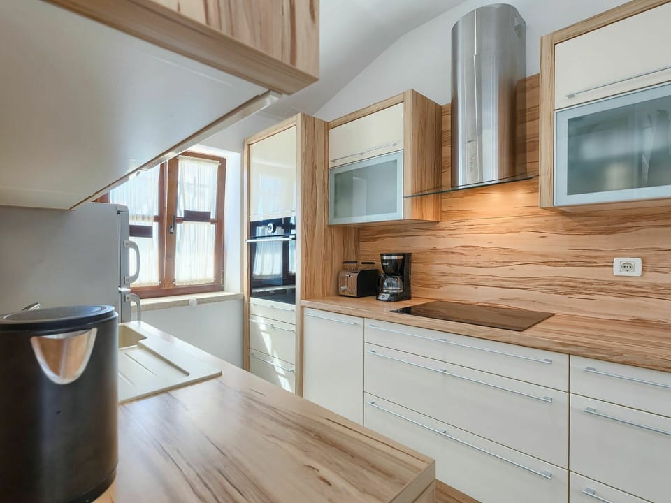 Cabinetry, Countertop, Furniture, Property, Building, Window, Tap, Kitchen, Wood, Sink