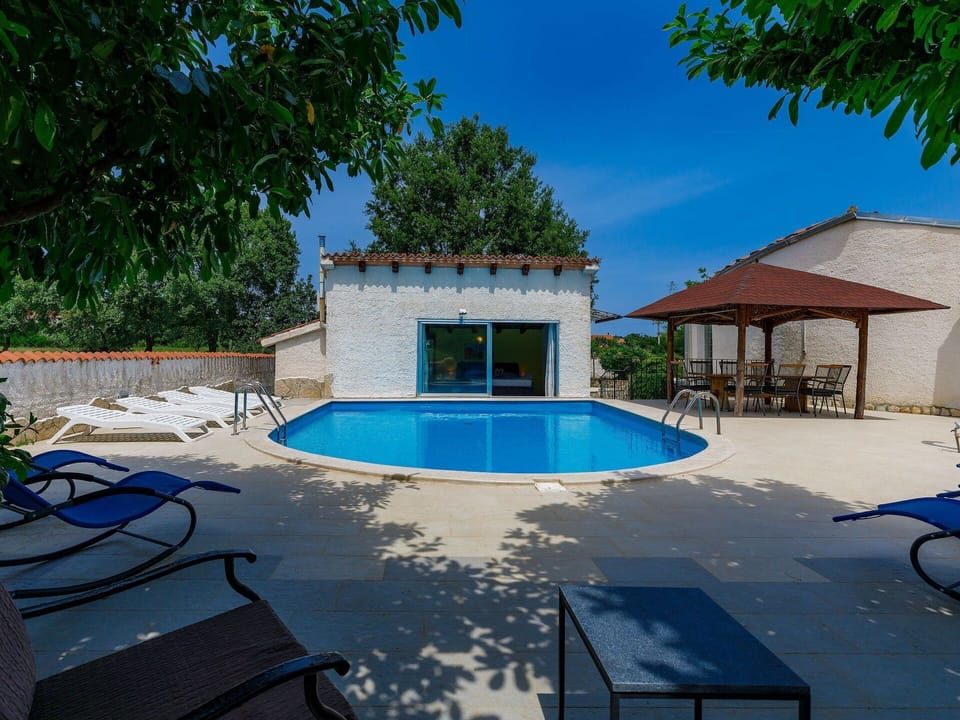Water, Plant, Property, Sky, Swimming Pool, Blue, Building, Shade, Outdoor Furniture, Tree