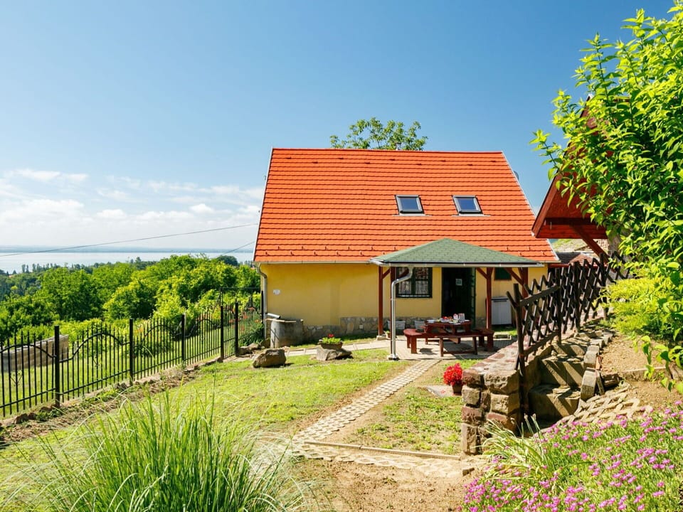 Sky, Plant, Building, Cloud, Window, Natural Landscape, House, Tree, Land Lot, Cottage