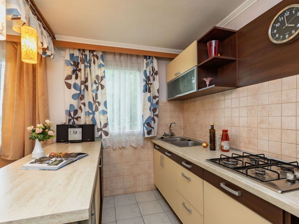 Interior Design, Countertop, Furniture, Kitchen, Flooring, Major Appliance, Cabinetry, Floor, Room, Home