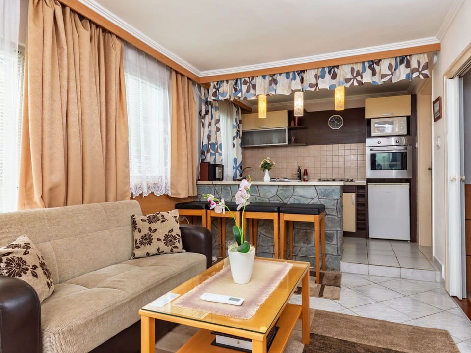 Furniture, Interior Design, Flooring, Wood, Floor, Room, Lighting, Ceiling, Table, Countertop