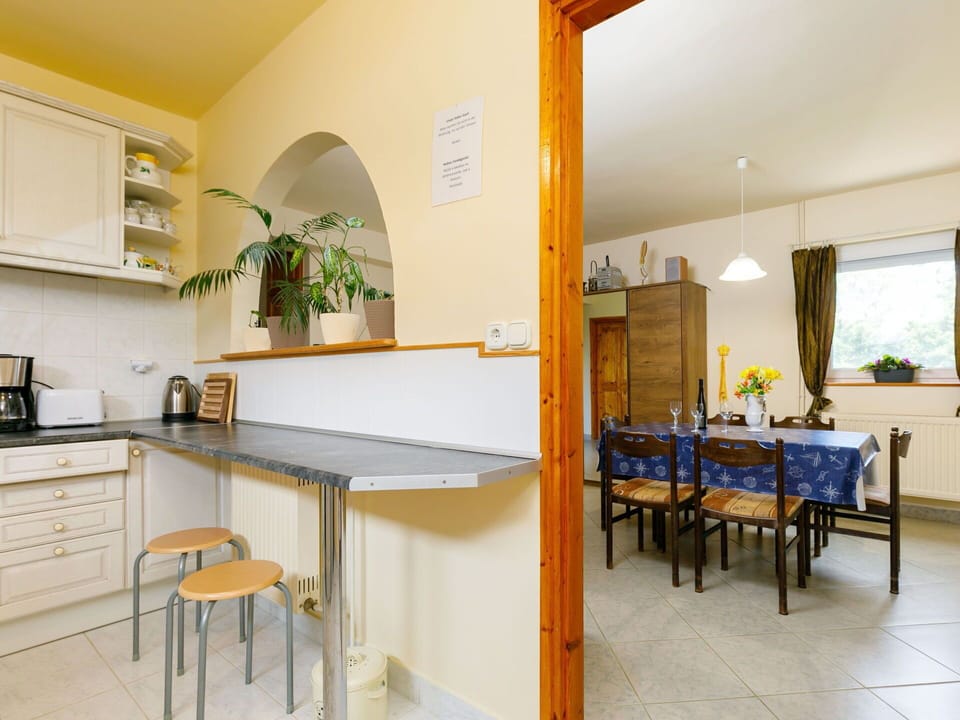 Furniture, Plant, Property, Table, Houseplant, Cabinetry, Wood, Building, Architecture, Interior Design