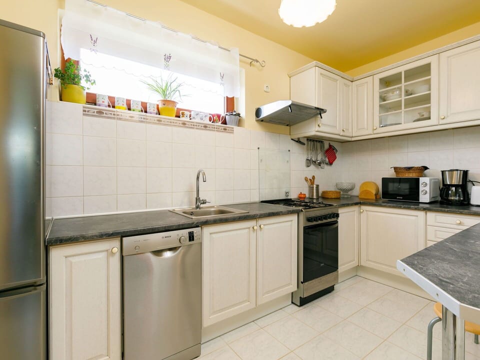 Cabinetry, Countertop, Kitchen Sink, Sink, Kitchen Appliance, Kitchen Stove, Kitchen, Home Appliance, Wood, Interior Design