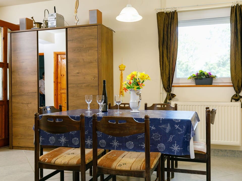 Table, Furniture, Property, Cabinetry, Building, Plant, Window, Wood, Lighting, Interior Design