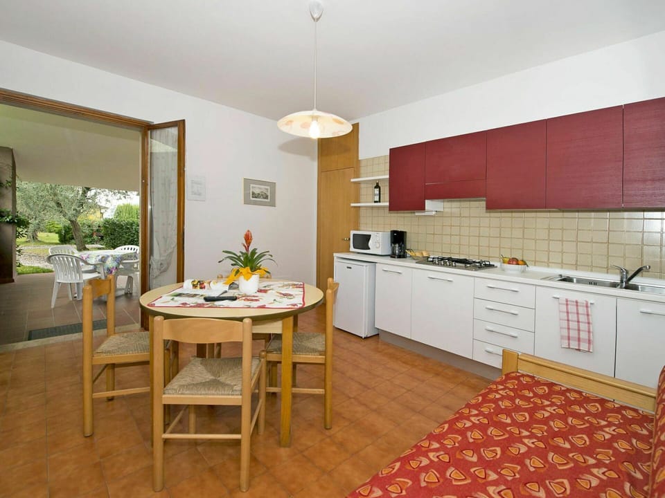 Furniture, Cabinetry, Countertop, Sink, Table, Houseplant, Kitchen, Tap, Plant, Building
