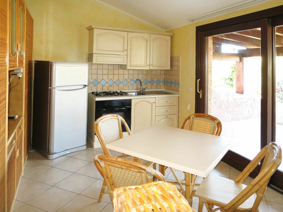 Room, Furniture, Property, Building, House, Floor, Yellow, Interior Design, Kitchen, Table