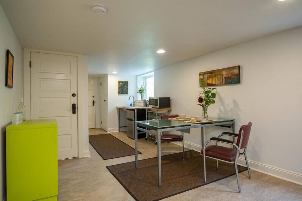 Dishware, cutlery, glassware, storage containers provided.