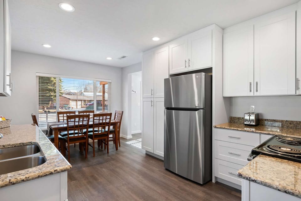 There's 1 bedroom on Northside of house and 2 on Southside with Kitchen and FR in between