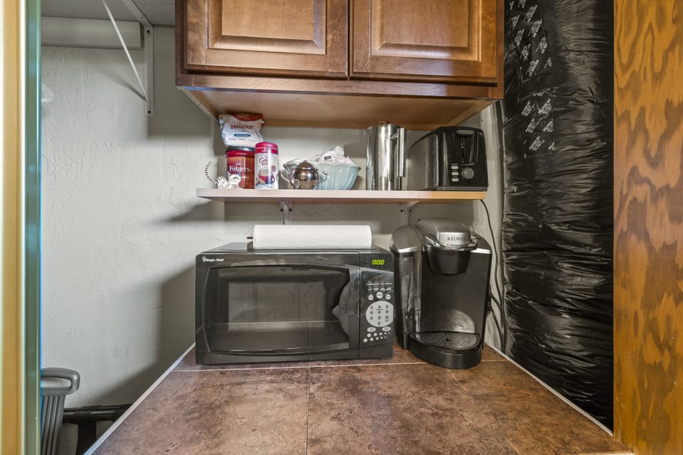 Kitchenette; microwave, coffee maker, 
small refrigerator, toaster 