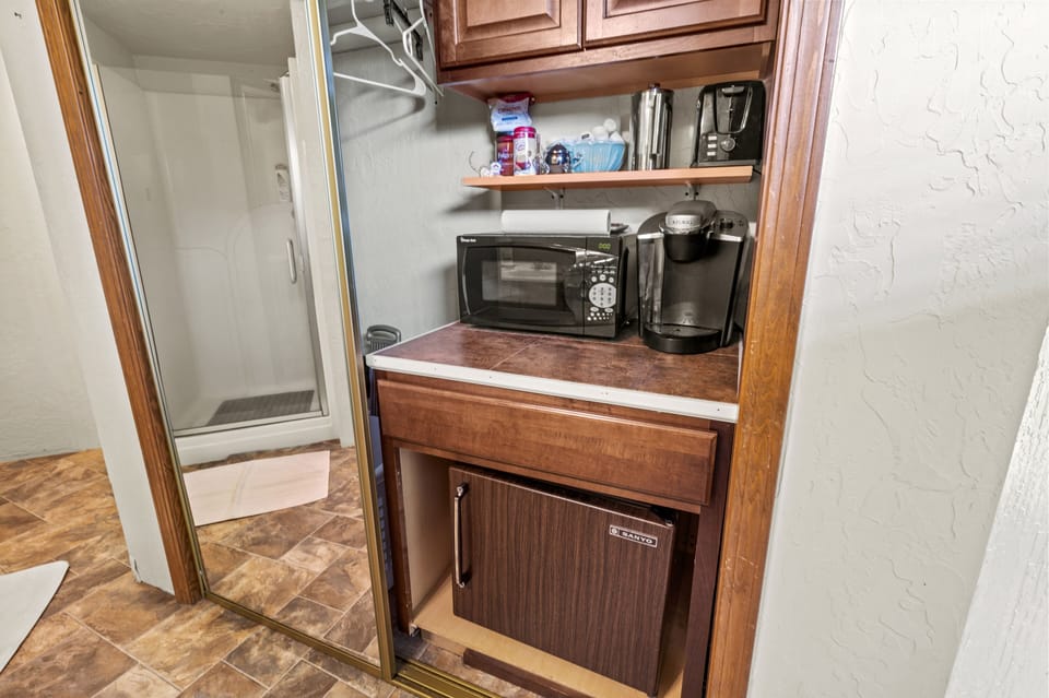 View of closet and kitchenette