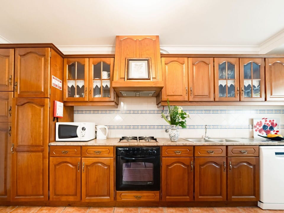 Brown, Countertop, Cabinetry, Property, Furniture, Kitchen, Kitchen Appliance, Drawer, Wood, Building