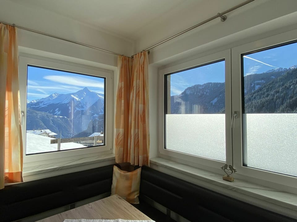 Building, Sky, Property, Window, Mountain, Azure, Shade, Wood, House