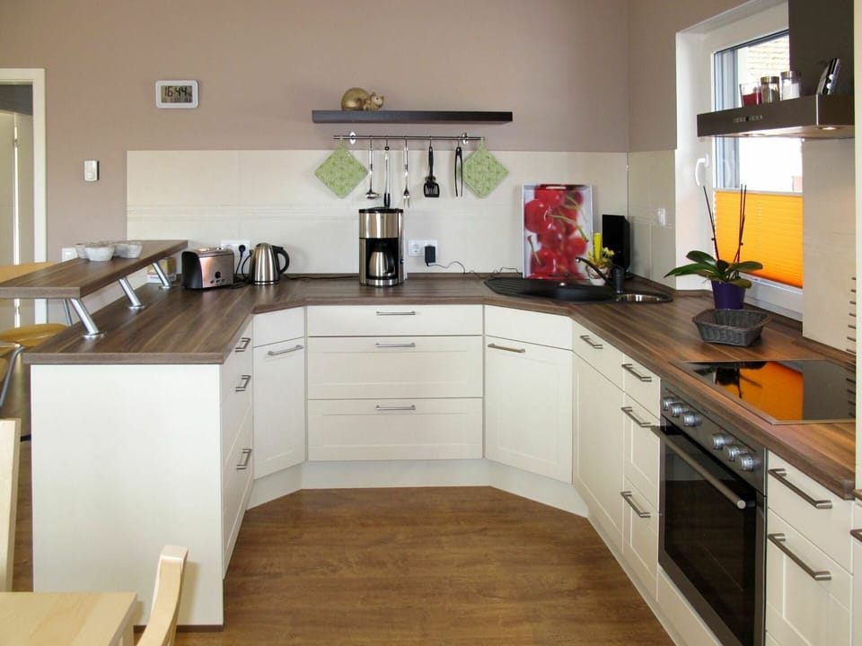 Countertop, Room, Kitchen, Furniture, Property, Cabinetry, Interior Design, Yellow, Building, Floor