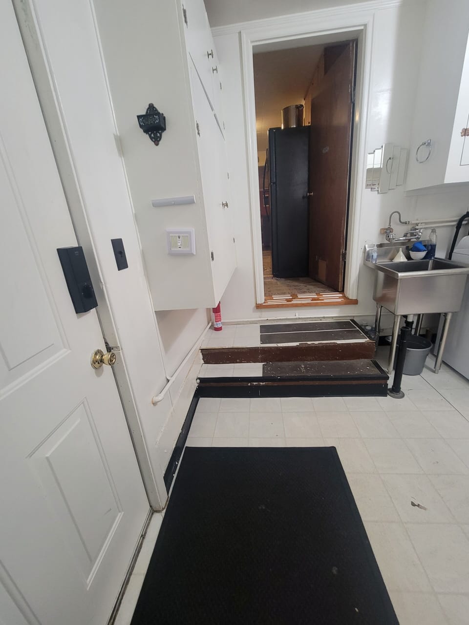 mudroom 2 steps up to kitchen 