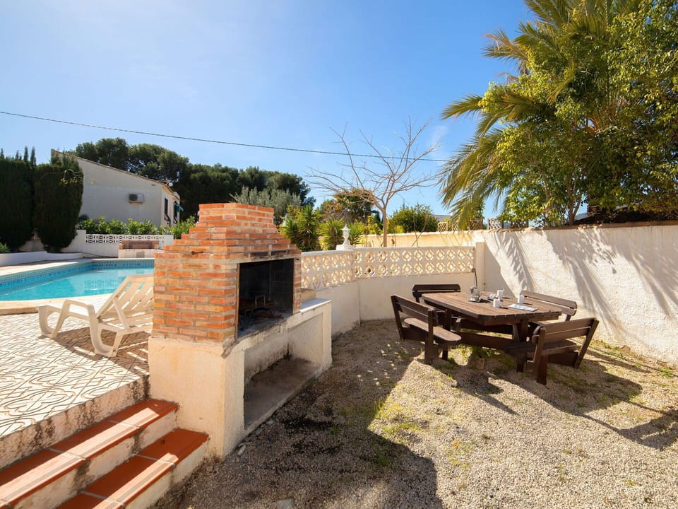 Sky, Plant, Tree, Building, Outdoor Furniture, Shade, Land Lot, Wood, Outdoor Bench, Leisure