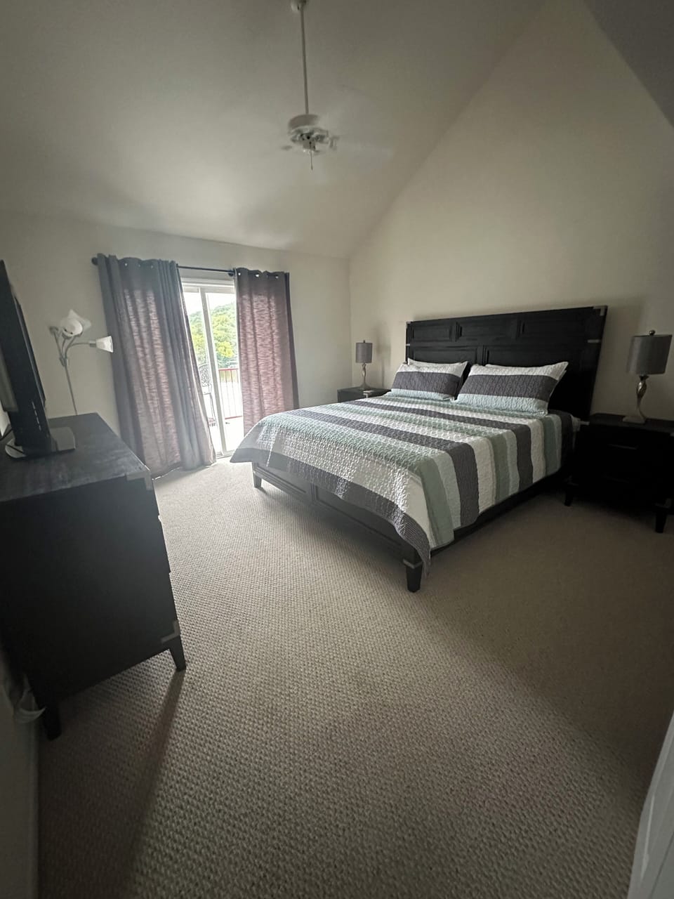 Master bedroom with king beds and access to the deck.