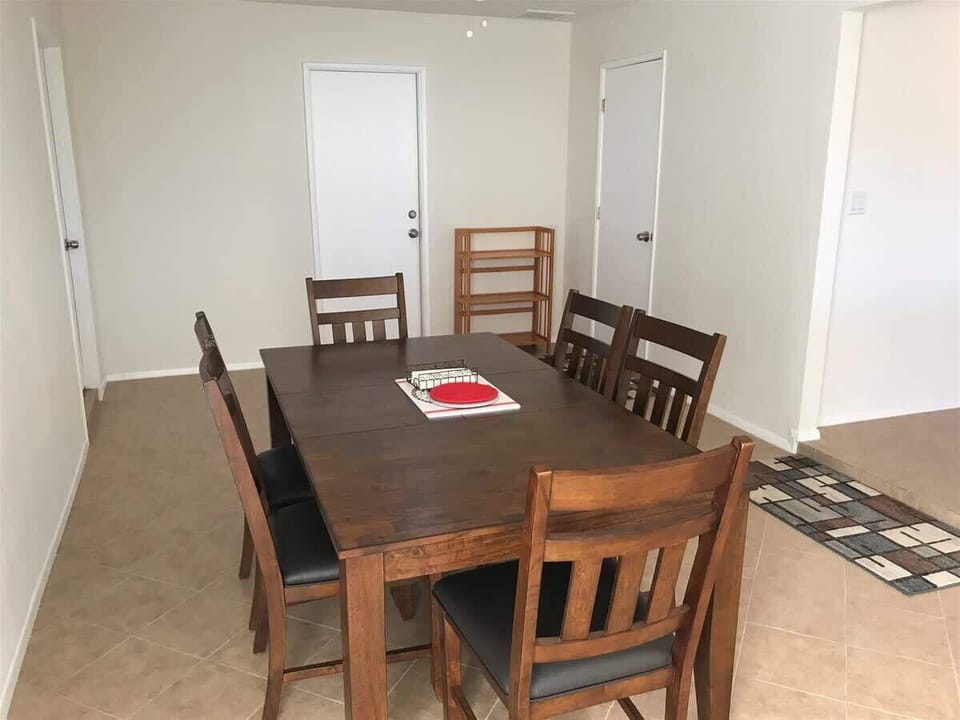The dining table seats 6 guests