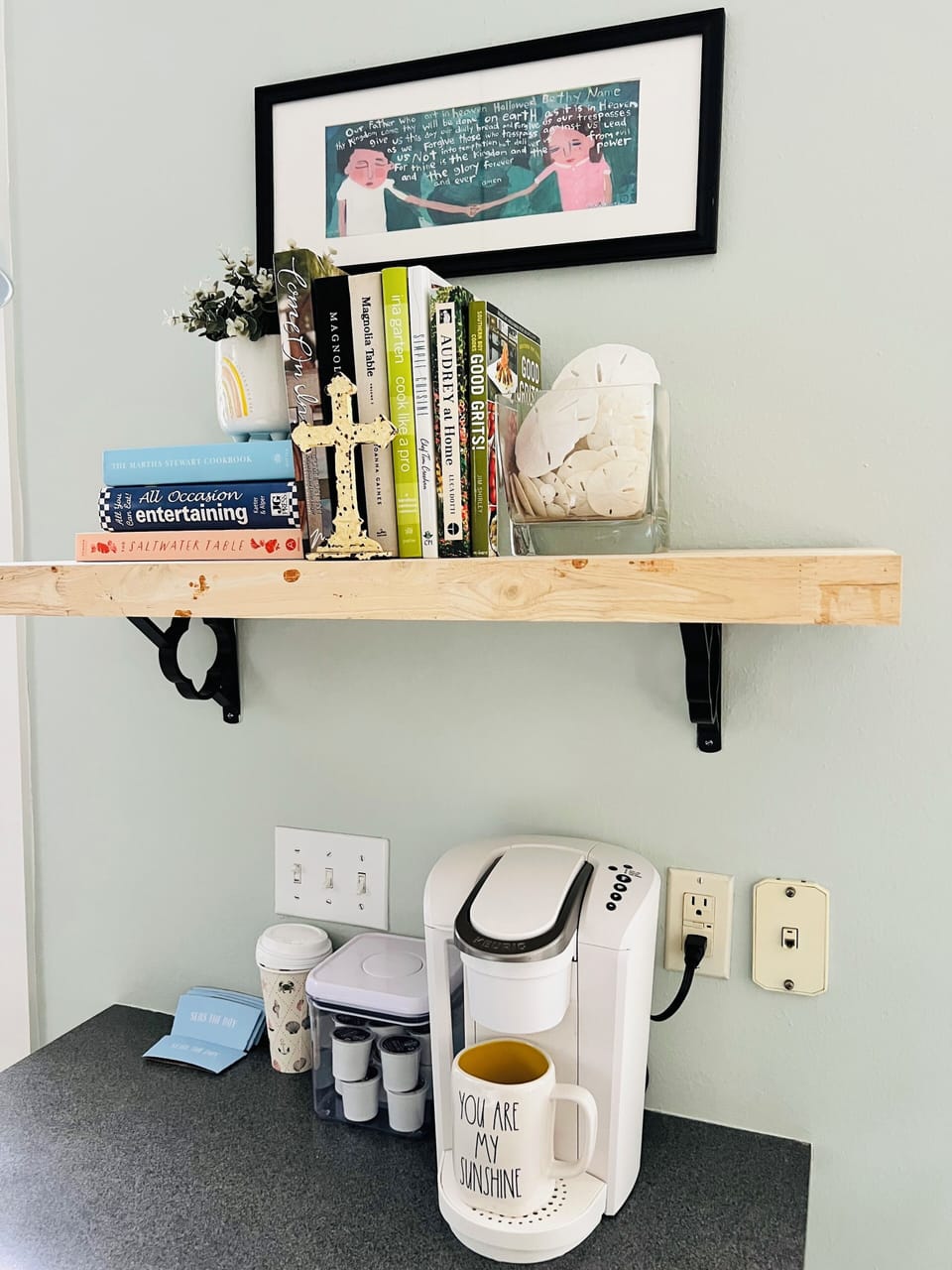 Our coffee bar with pods included in your stay plus  lots of cookbooks to read