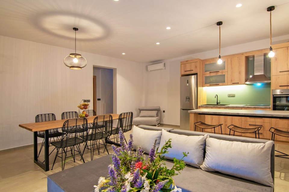 Fully equipped kitchen and living area of Spectacular Sea View Villa,Near Taverns & Sandy Beaches