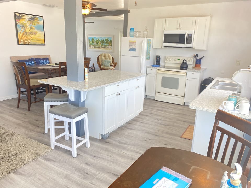 New quartz countertops, new windows/flooring/cabinets/microwave oven over range