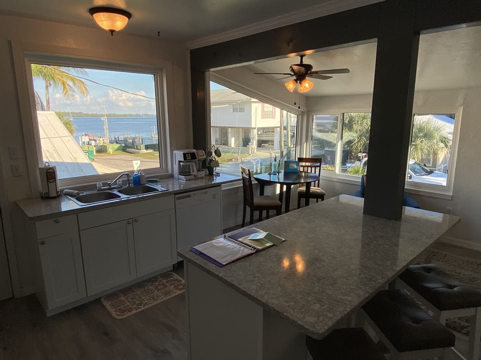New quartz countertops, new windows/flooring/cabinets/microwave oven over range