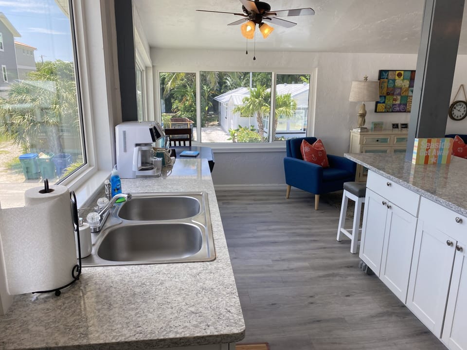 New quartz countertops, new windows/flooring/cabinets/microwave oven over range