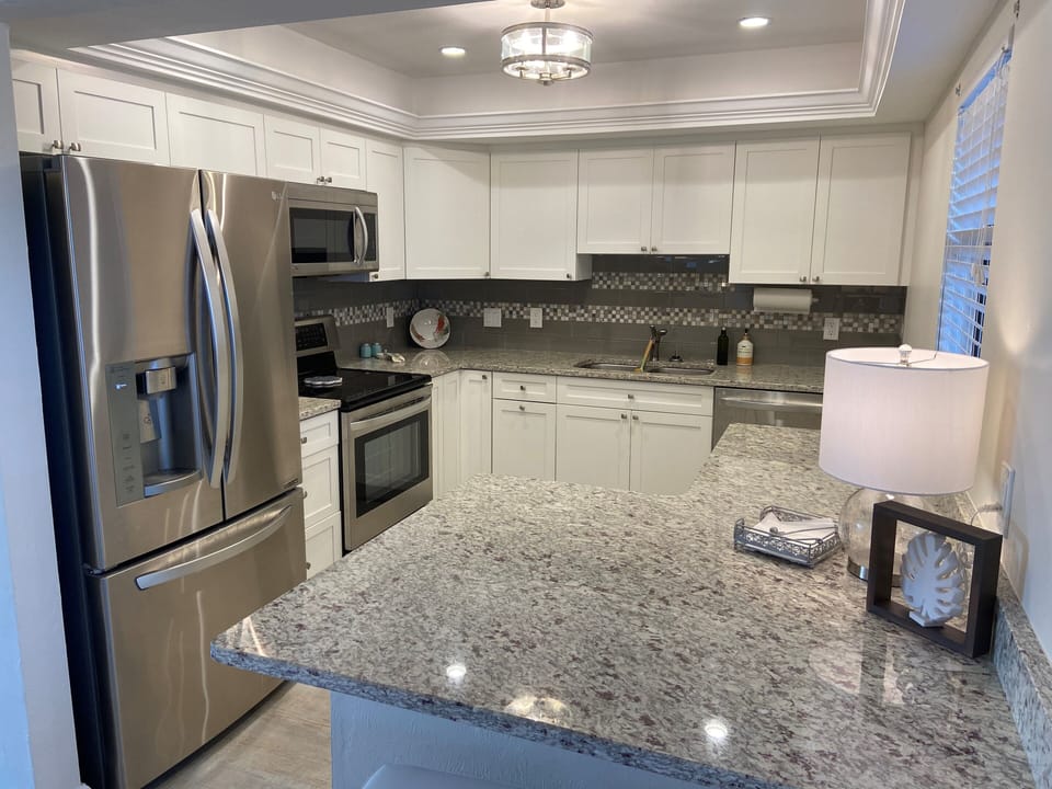 Kitchen with convection oven and stainless steel appliances