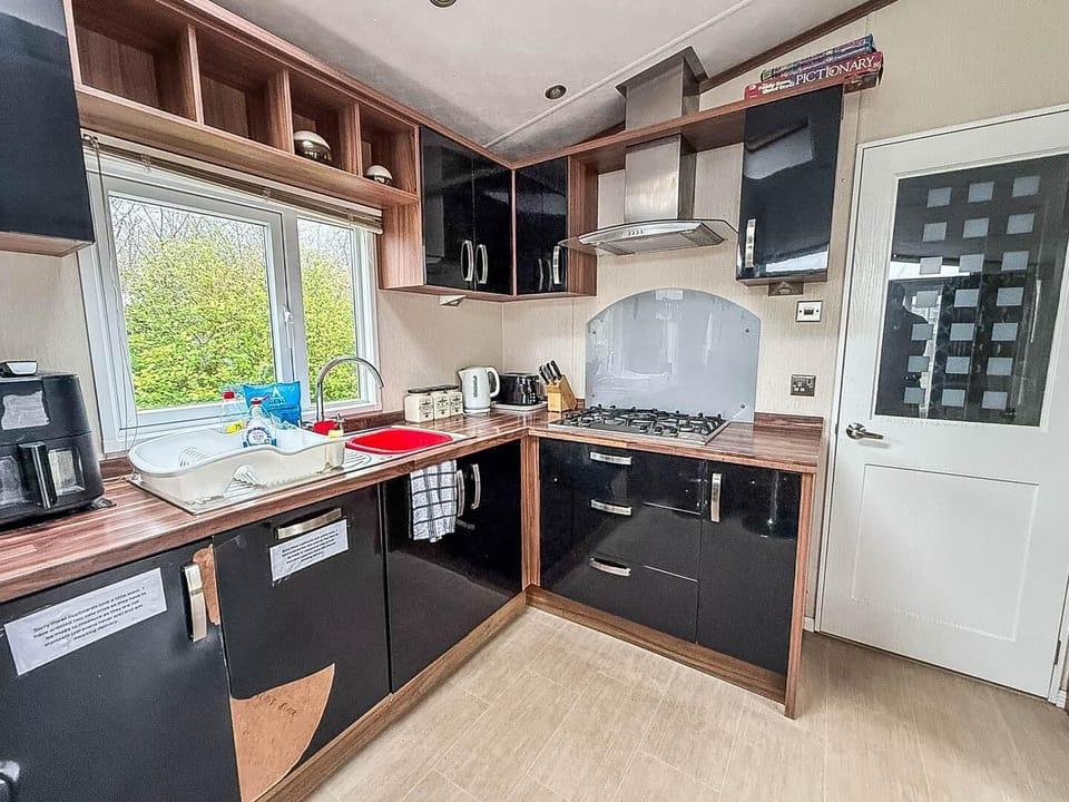 Our modern caravan kitchens are designed with both style and function in mind, making them perfect for your getaways.