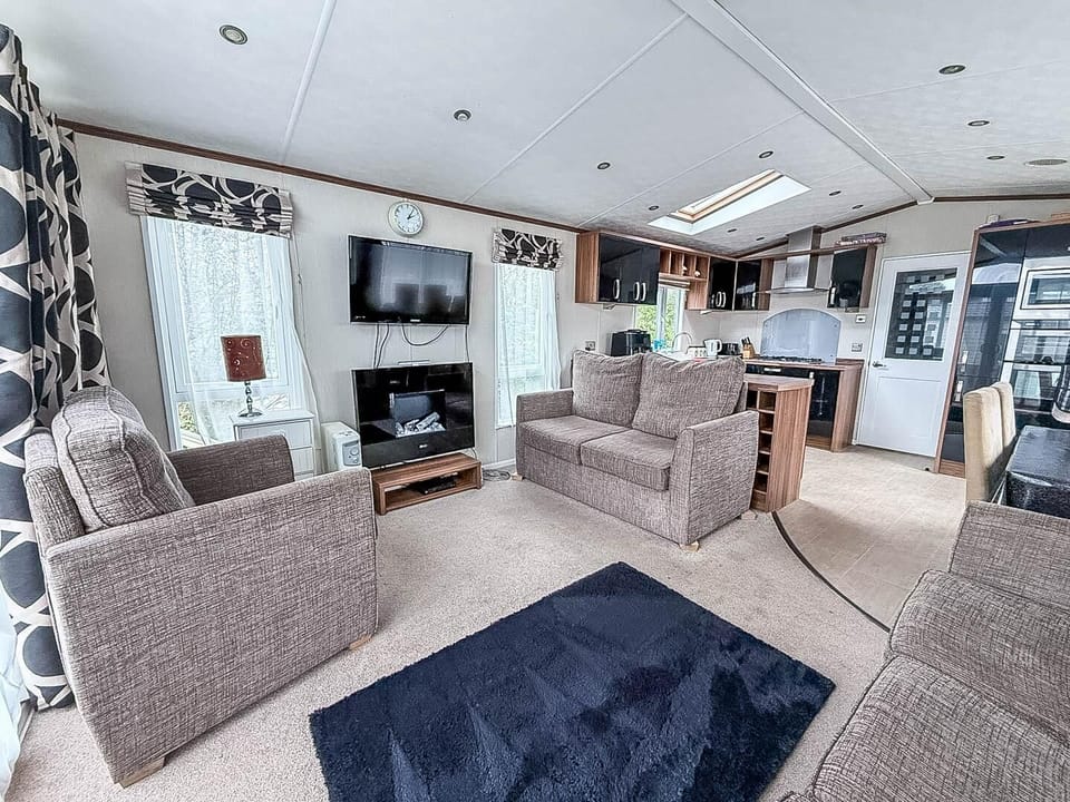 The living room in our caravans provides a cosy retreat, perfect for your spontaneous getaways and well-deserved breaks in Norfolk.