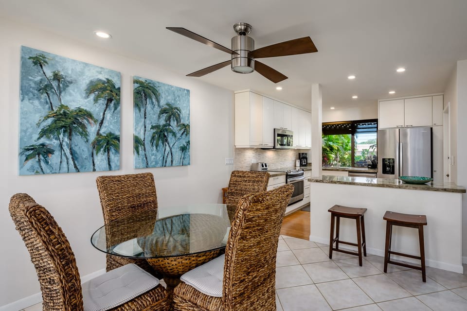 The dining room and breakfast bar provide plenty of space for family time.